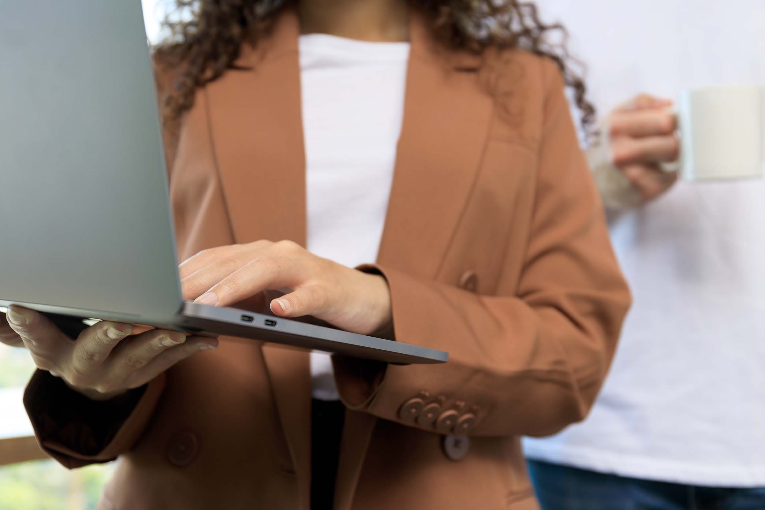 lady-holding-up-laptop